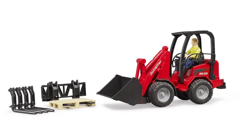 Schäffer Compact loader 2630 with figure and acces – 02191 · 1:16 by Bruder – product photo 1 of 2