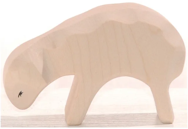Houten schaap etend